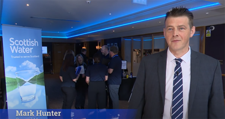 Annual Development Forum 2025 Mark Hunter, General Manager of Development and Operational Services, in a suit, at Scottish Water at the Annual Development Forum 2025