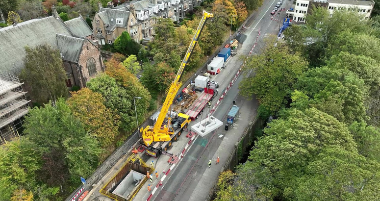 Traffic was halted for a few minutes while the concrete overflow chamber lid was swung into place IUW Murrayfield Corstorphine Road
