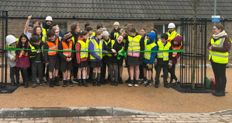 Invergowrie Primary School pupils cutting the ribbon on the improved car park
