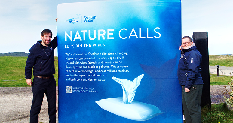 Scottish Water regional manager Gavin Steel holding banner calling us to bin the wipes with our Nature Calls campaign