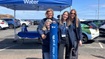 Four Scottish Water Employees smiling beside Top Up Tap