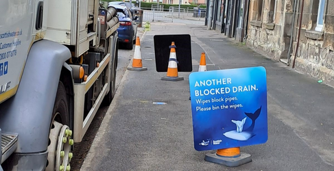Scottish Water street signage informing that there has been a sewer blockage