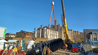 The screw pump is lowered into place at McDonald Road Pumping Station in Edinburgh The screw pump is lowered into place at McDonald Road Pumping Station in Edinburgh