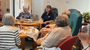 Nicola Anderson speaking to residents about Scottish Water