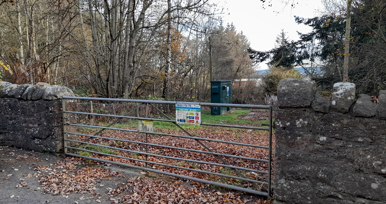 This image shows the site of Windhill pumping station. The station itself is beyond a fence.