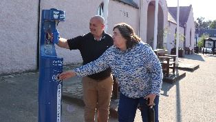 Customers filling up bottle at Braemar Top-Up-Tap