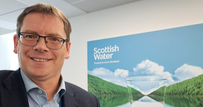 head and shoulder shot of Alex Plant