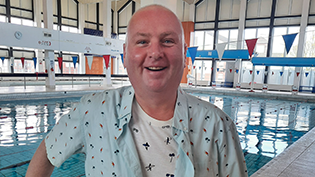 Paul Cowan visiting his local pool for swimming classes to improve his mental health