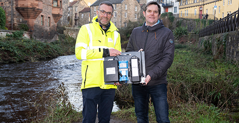 Professor Simon Parsons, left, with Calum Duncan of the Marine Conservation Society, with an Event Duration Monitor at Water of Leith, Stockbridge
